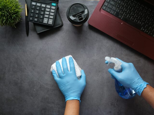 Mindful Cleaning Services expert cleaning a kitchen countertop in Boonton, NJ.